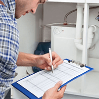 Technician performing inspection